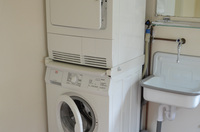 Wasmachine en droger in de bijkeuken